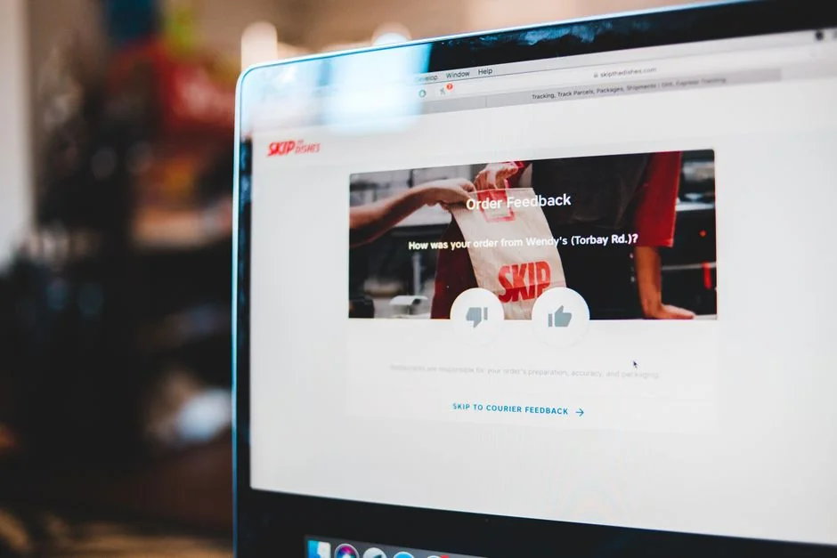 A laptop displaying an online checkout form, highlighting technology and e-commerce.